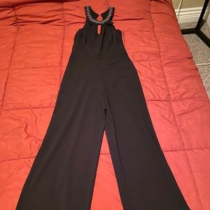 Haltered formal jumpsuit w/ jewelled neck lining